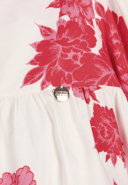 Kremowa mini sukienka z rozkloszowanym dołem AYOTE