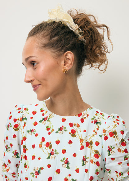 Błękitna sukienka midi w autorski print CALANA