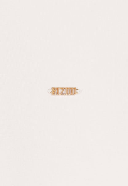 Kremowy longsleeve z poduszkami na ramionach MELISSANDRA