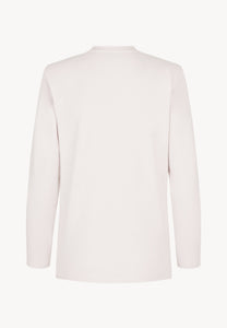 Kremowy longsleeve z poduszkami na ramionach MELISSANDRA