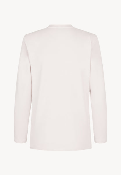 Kremowy longsleeve z poduszkami na ramionach MELISSANDRA