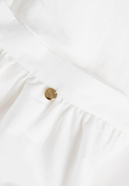 Kremowa spódnica midi NUBE