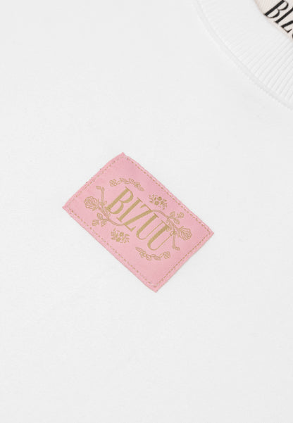 Kremowy T-shirt oversize z logo PARADISO