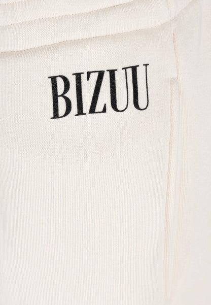 Kremowe spodnie dresowe z szerokimi nogawkami PETRA