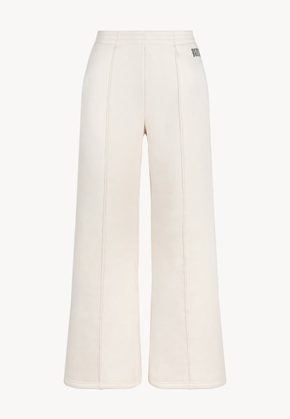Kremowe spodnie dresowe z szerokimi nogawkami PETRA