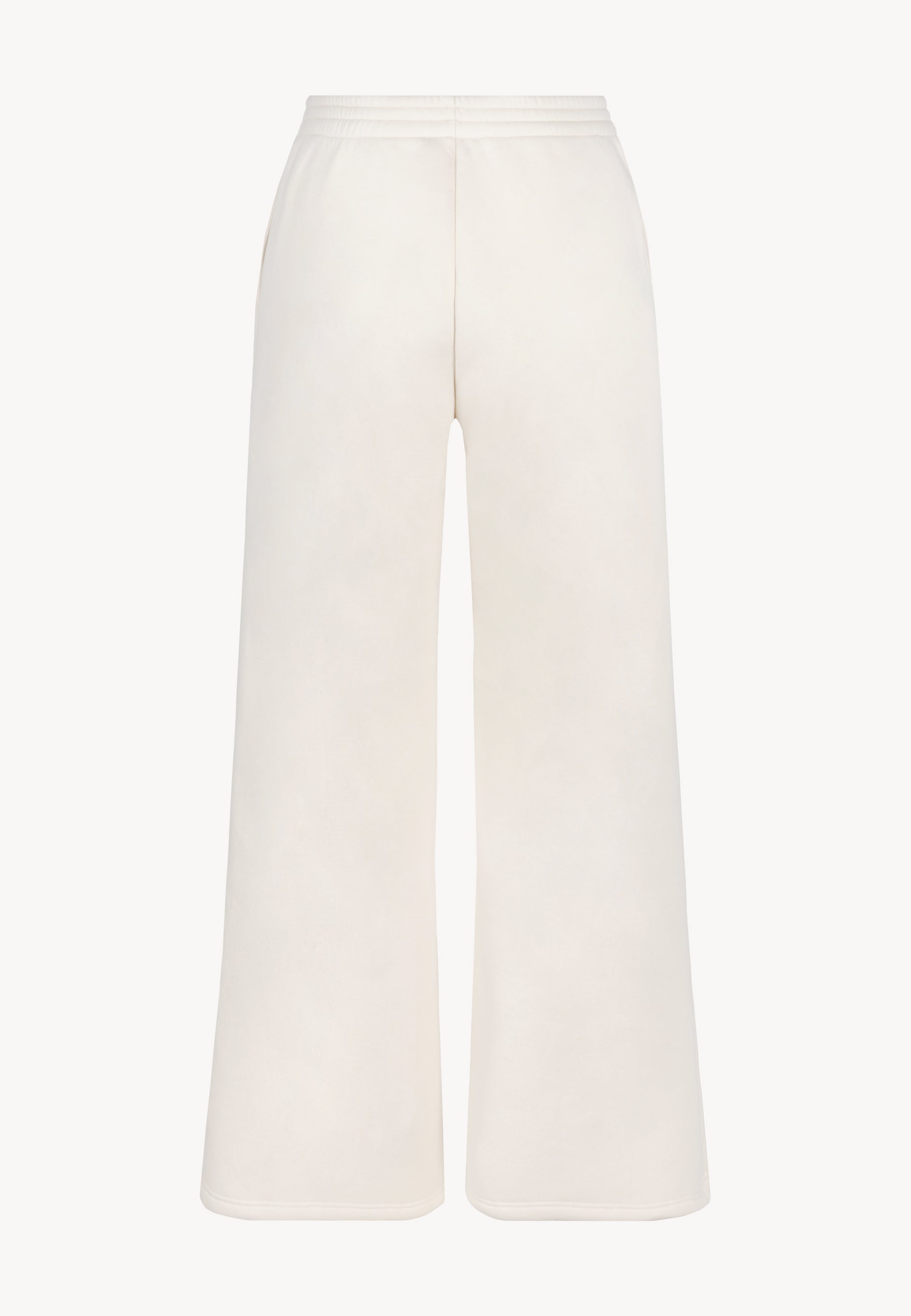 Tył kremowych spodni dresowych PETRA.