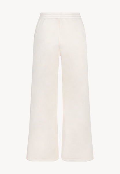 Kremowe spodnie dresowe z szerokimi nogawkami PETRA