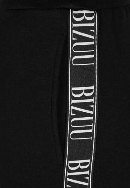Czarne luźne spodnie dresowe z lampasem PETRY