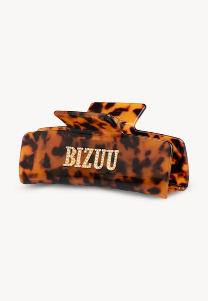 Brązowa klamra do włosów z logo RHODI