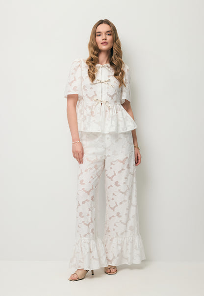 Kremowe spodnie w kwiatowy wzór LAVENDOU