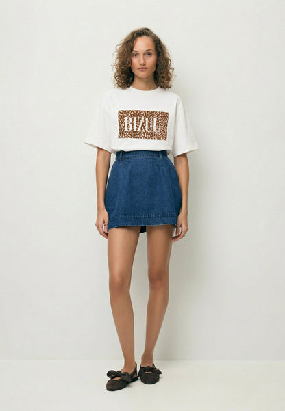 Kremowy T-shirt oversize z logo SIME